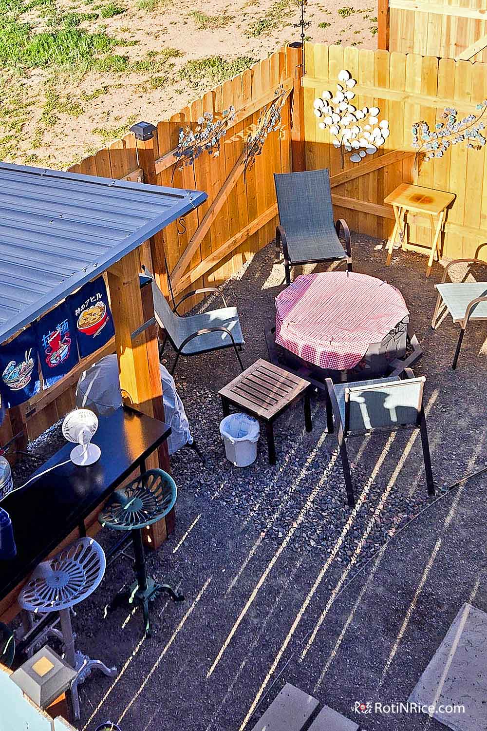 Our Outdoor Kitchen with a fenced in, private sitting area.