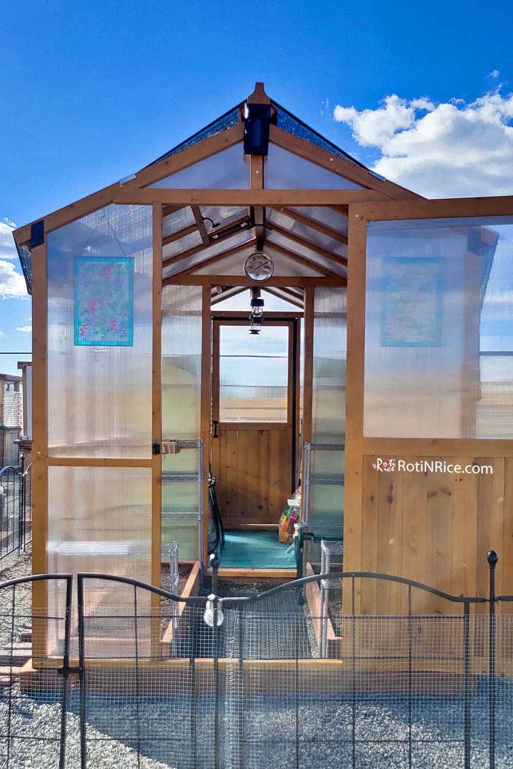 Our Stand-Alone Greenhouse with a front and back door.