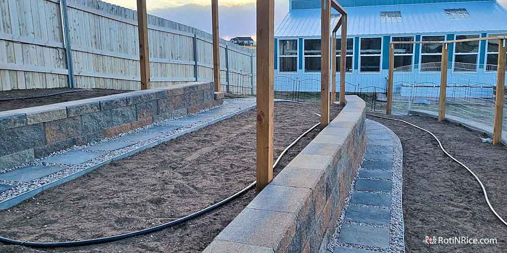 Putting in the irrigation for each of the three levels of planting area.